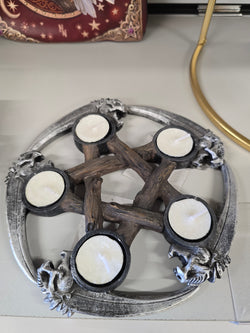 Scythe pentagram tealight holder.