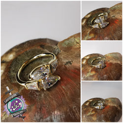 18ct Yellow Gold and premium zirconia hinged ring.